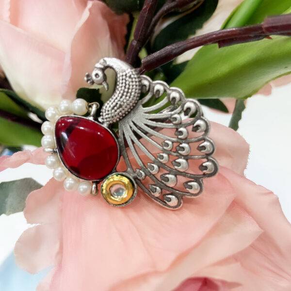 Regal Peacock Statement Ring – Red Ruby